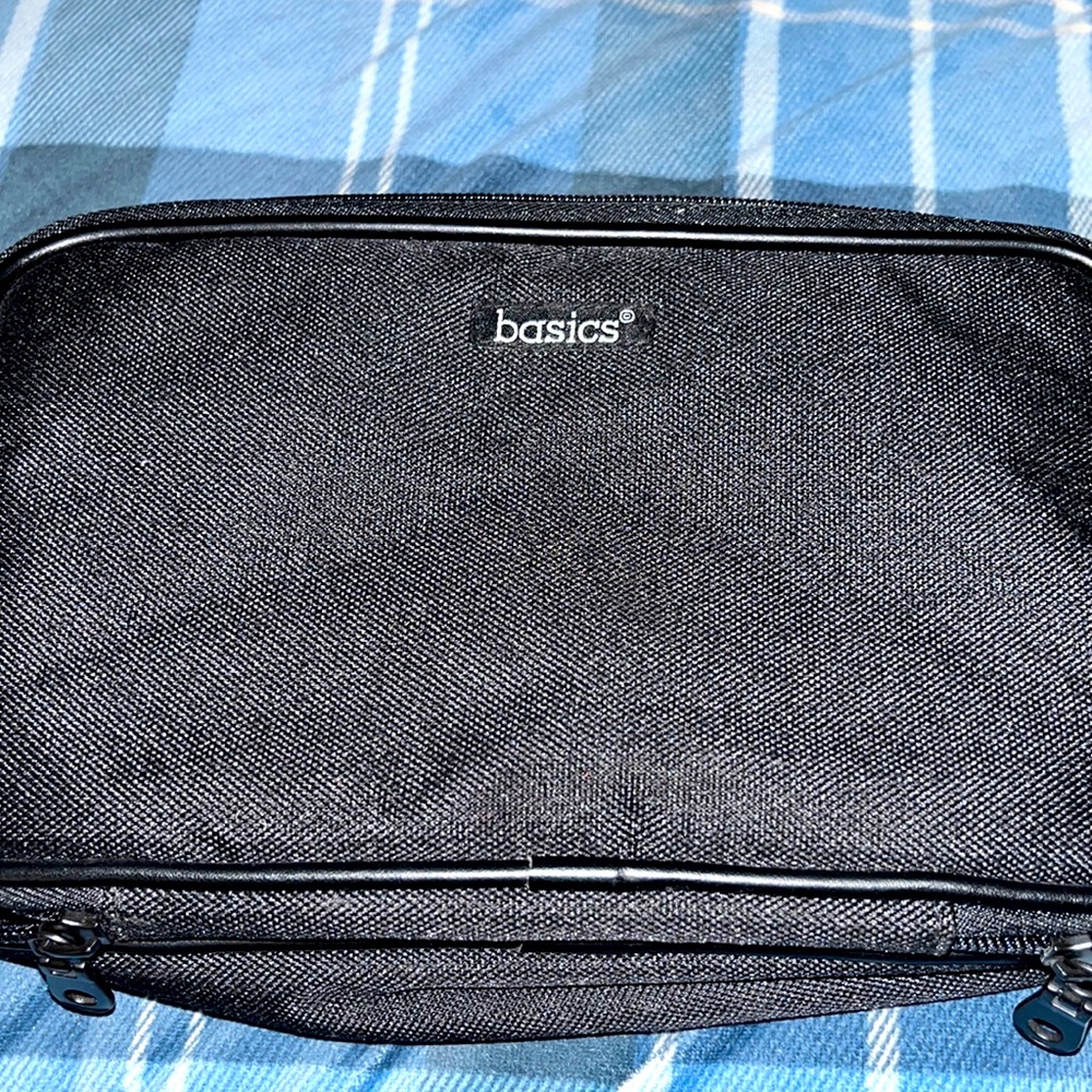 NWOT! Basics brand toiletry Bag with 6 manicure tools.